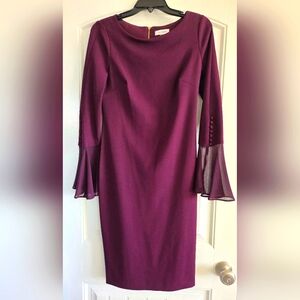 Calvin Klein dress with flowy sleeves and buttons. Burgundy